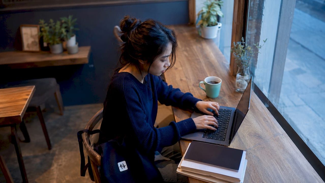 Hands typing code connecting WebSocket feed