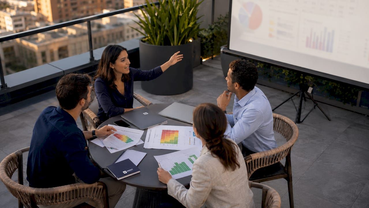 Team discussing risk assessment in conference room